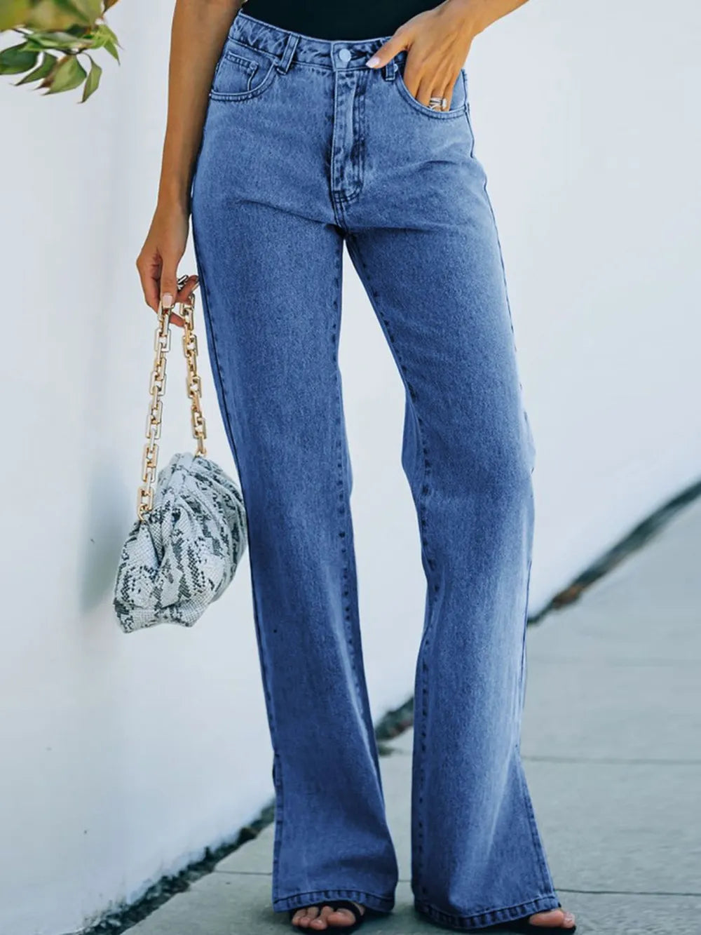 Pantalon en jean délavé à taille fendue avec un pantalon décontracté taille moyenne